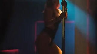 Pair of performers in motion on a wide bed