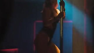 Pair of performers in motion on a wide bed