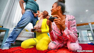 Solo performer with a toy on rumpled bedsheets