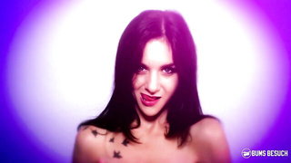 Explicit doggy style scene on a wide bed