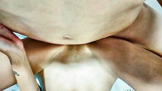Close frame of an explicit scene in sharp indoor light