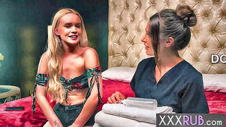 Amateur couple on a living room sofa in explicit scene