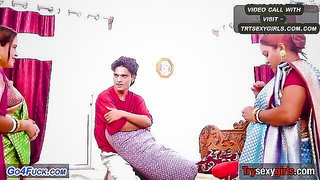 Couple on a patterned bedspread in an explicit scene