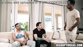 Amateur couple on a living room sofa in explicit scene