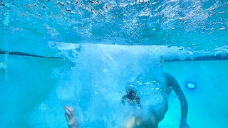 Close frame of an explicit scene in sharp indoor light