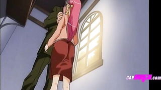 Couple on a made bed in an explicit scene