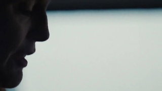Explicit massage scene in a softly lit room