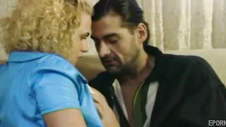 Explicit doggy style scene on a wide bed