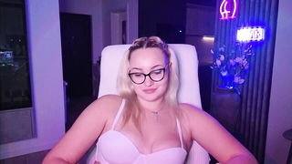Explicit massage scene in a softly lit room