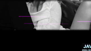 Explicit massage scene in a softly lit room
