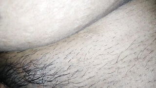 Explicit massage scene in a softly lit room