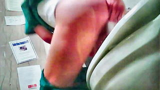 Solo performer with a toy on rumpled bedsheets