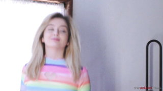 Explicit massage scene in a softly lit room