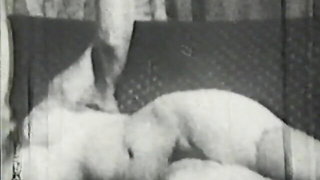 Explicit doggy style scene on a wide bed