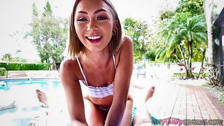 Amateur couple on a living room sofa in explicit scene
