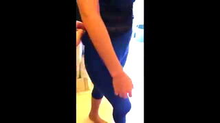 Studio set with performers in an explicit scene under bright lights