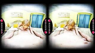 Solo performer with a toy on rumpled bedsheets