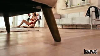 Pair of performers in motion on a wide bed