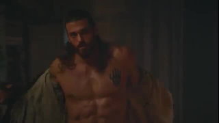 Explicit massage scene in a softly lit room