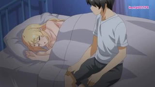 Couple on a made bed in an explicit scene