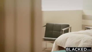 Explicit doggy style scene on a wide bed