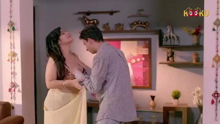 Explicit massage scene in a softly lit room