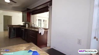 Solo performer with a toy on rumpled bedsheets