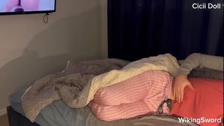 Pair of performers in motion on a wide bed