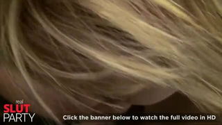 Amateur couple on a living room sofa in explicit scene