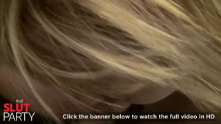Amateur couple on a living room sofa in explicit scene