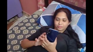 Couple mid-scene in a dim bedroom