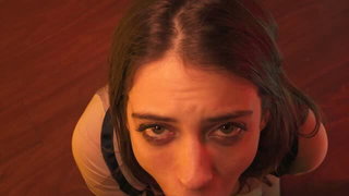 Solo performer with a toy on rumpled bedsheets
