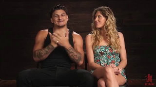 Explicit massage scene in a softly lit room