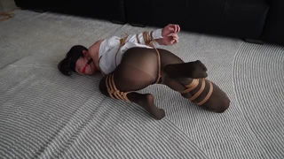 Explicit massage scene in a softly lit room
