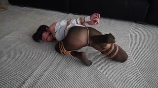 Explicit massage scene in a softly lit room