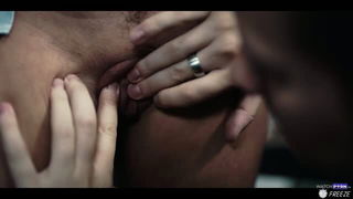 Close frame of an explicit scene in sharp indoor light