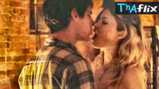 Explicit massage scene in a softly lit room
