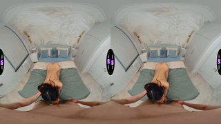 Couple mid-scene in a dim bedroom