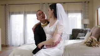 Explicit doggy style scene on a wide bed