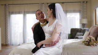 Explicit doggy style scene on a wide bed