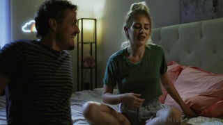 Explicit massage scene in a softly lit room